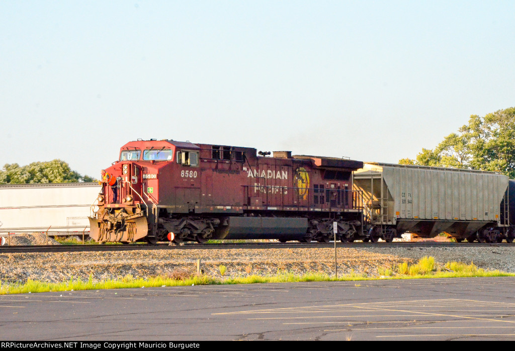 CP AC44CW Locomotive leading a train